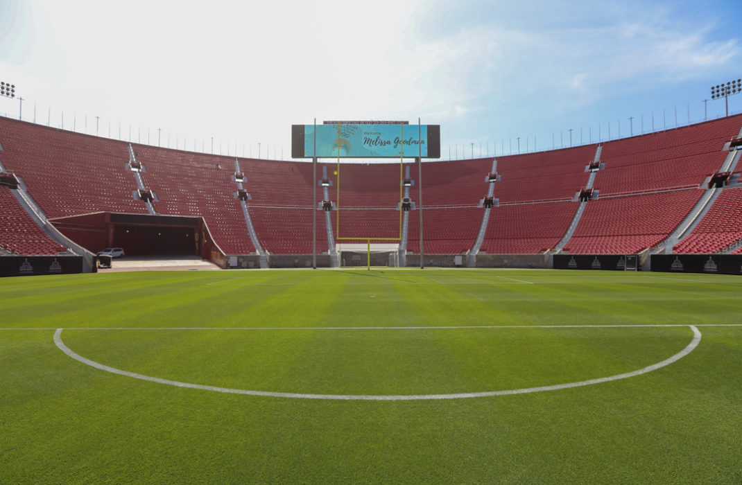 field with bleachers