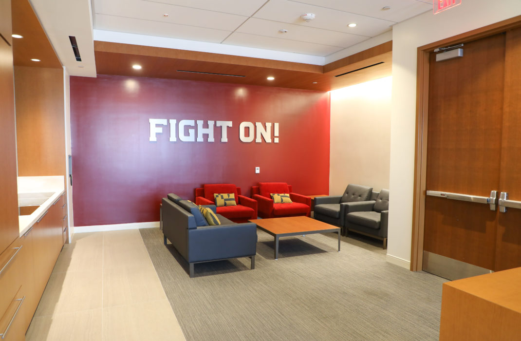 fight on logo text on wall