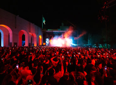 crowd under red light