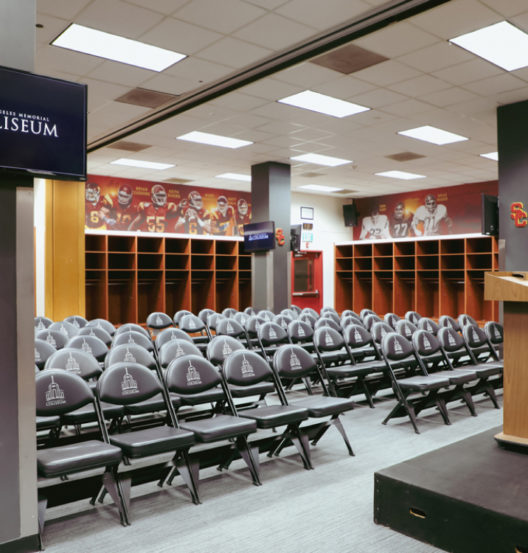 locker room with seats and podium