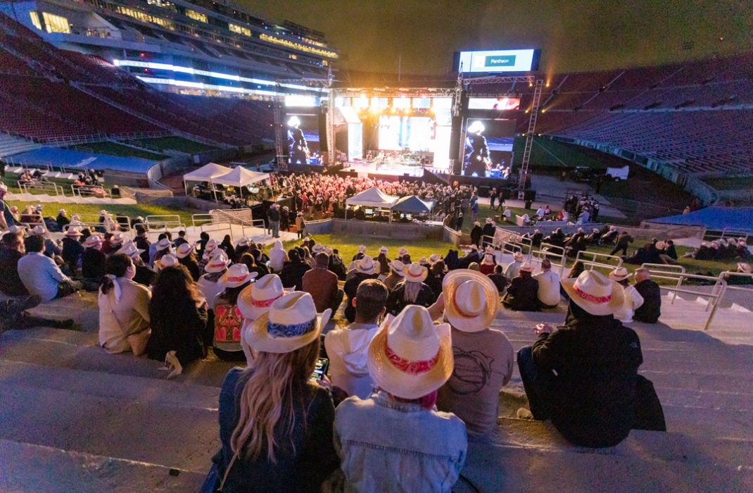 people sitting with hats