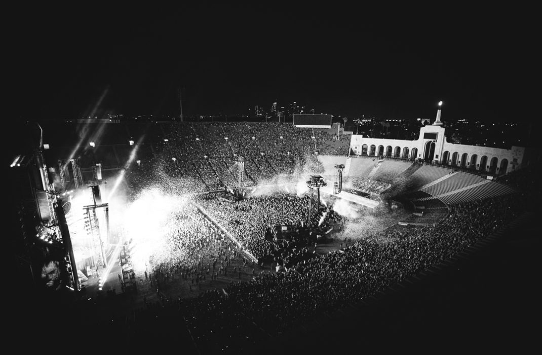 black and white photo of coliseum viewed from the top